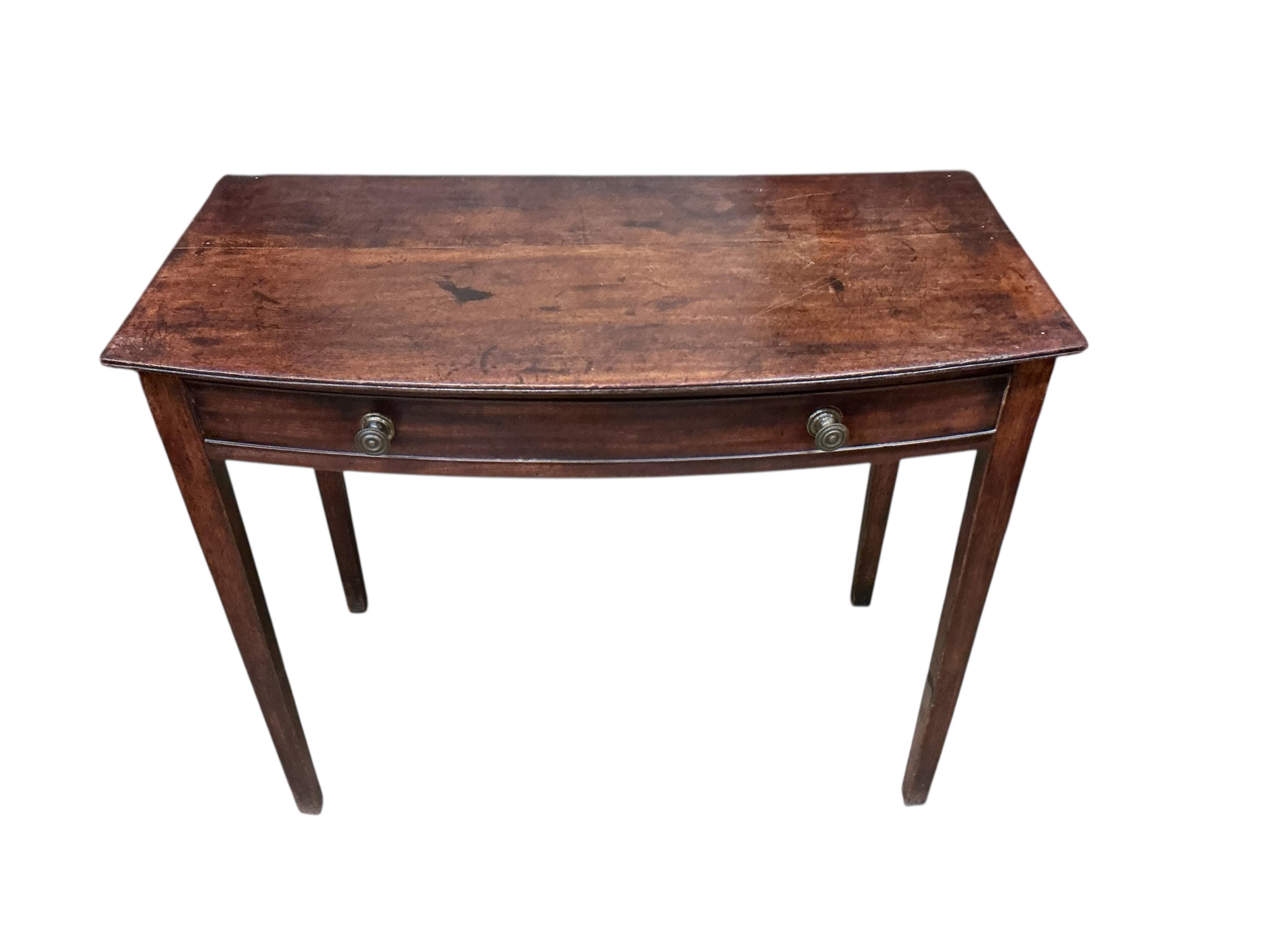 A George III mahogany bow front side table, with single frieze drawer, width 91cm, depth 45cm, height 74cm